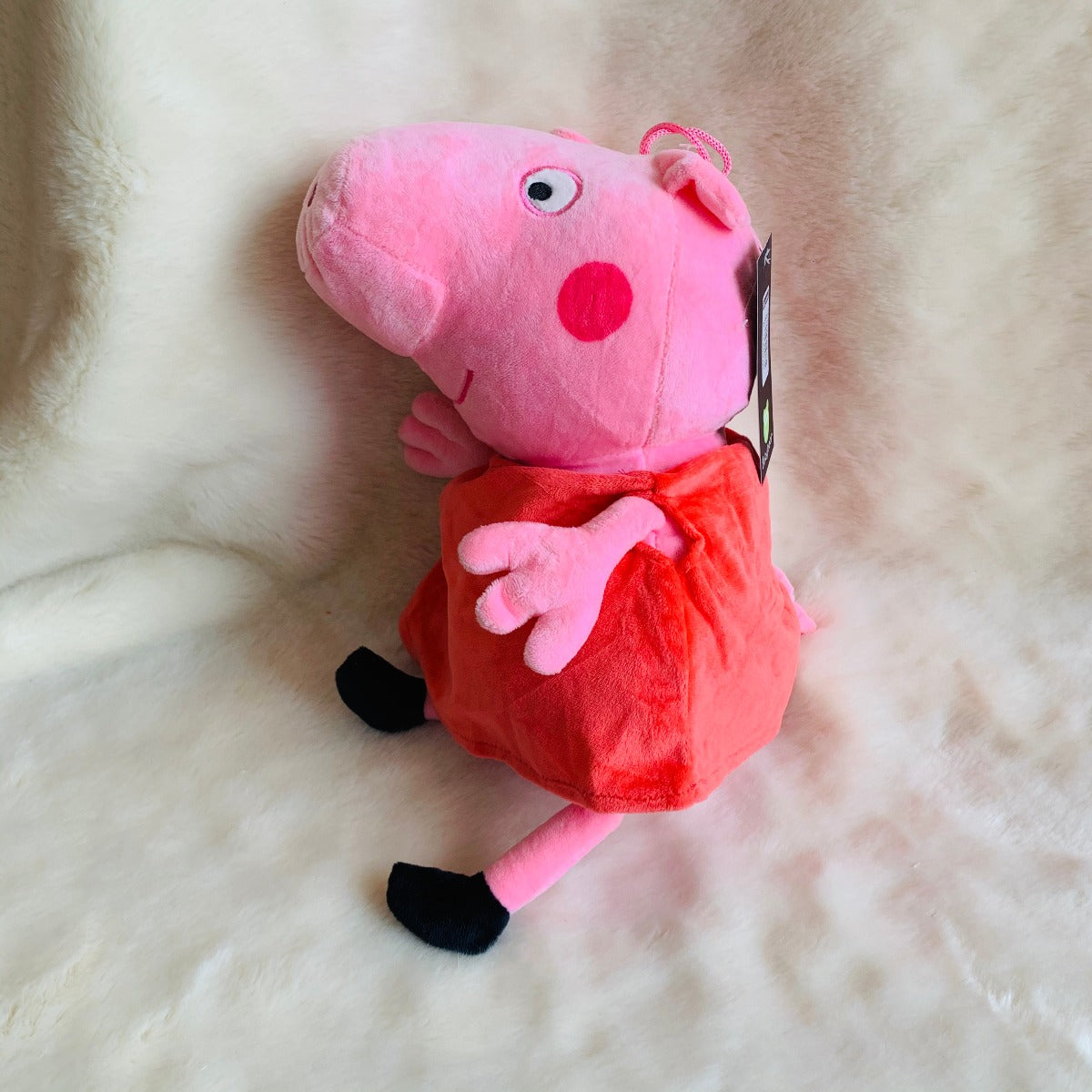 Peppa stands 12inches tall